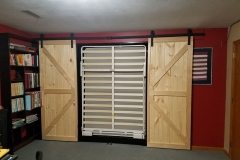 Murphy bed with shelves and barn doors