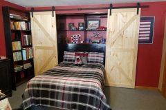 Murphy bed with shelves and barn doors
